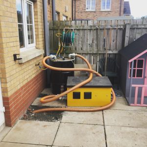 A VEU set up to remove odours from below a family home