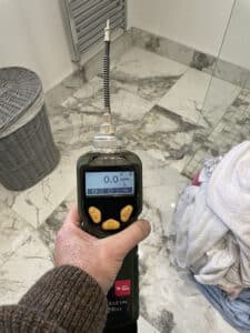 Using a PID to check internal VOC's in a residential property. Oil spills need to be accurately assessed 